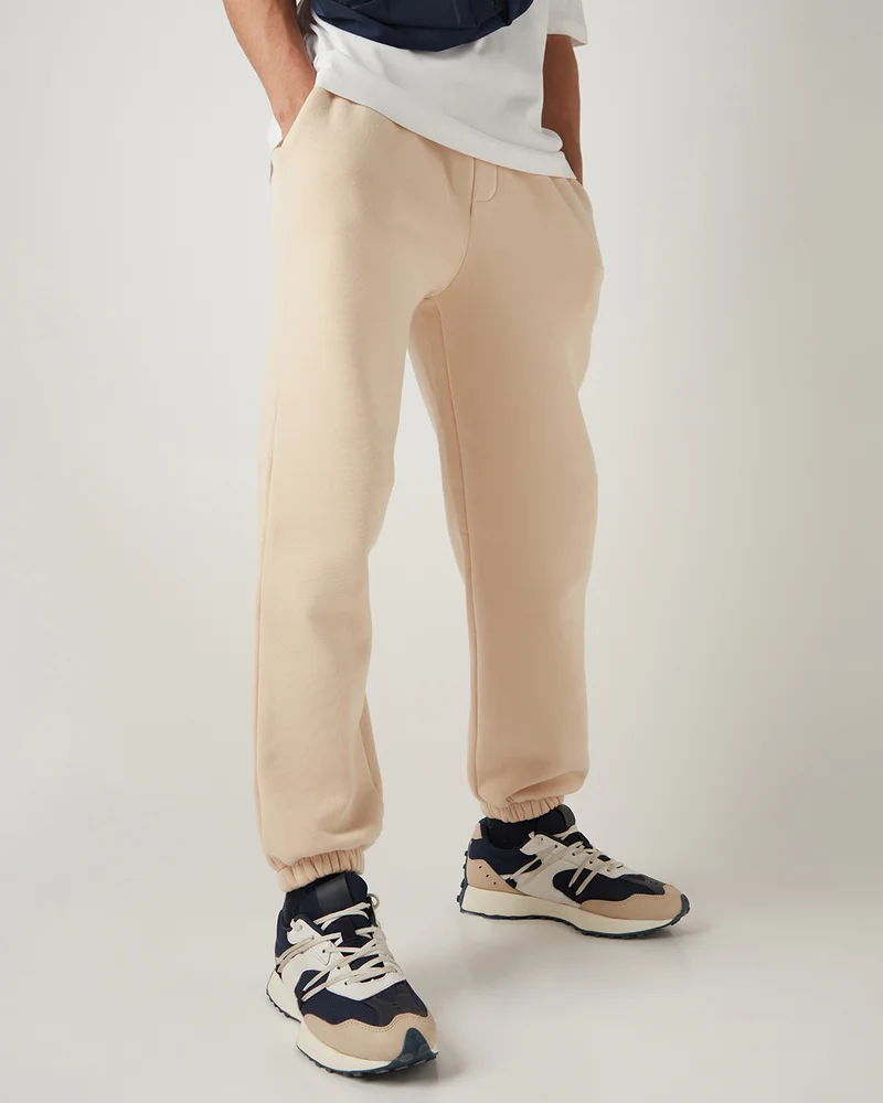 bewakoof Men's Beige Oversized Brushed Joggers